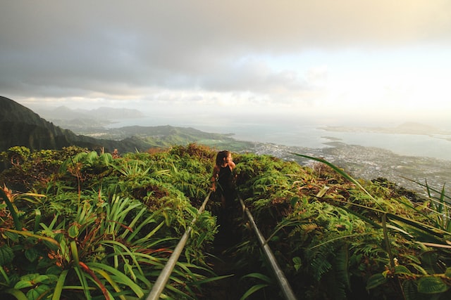 person at the top of summit hike in Hawaii